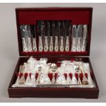 A mahogany cased canteen of silver plated cutlery made in Sheffield.