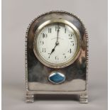 A Walker & Hall Limited silver plate mantle clock housing a French movement.Condition report