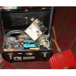 A box of various tools to include clamps, folding shovel etc.