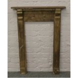 A wooden painted and distressed bedroom fire surround.
