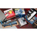 A quantity of tools to include Power Craft bench grinder, 1020 watt plunging router, and held