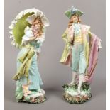 A pair of continental ceramic figures, depicting a courting couple in period dress. (both approx