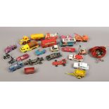 A box of glass marbles and Diecast vehicles to include Dinky, Corgi etc.