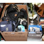 A box of cameras and equipment to include Nikon F50 camera, Tokina 80 -200mm 1:4 lense, carry