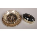 A silver pin dish assayed Birmingham 1931 along with a silver rimmed tortoise shell pin dish and a