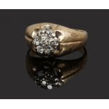 A gentleman's gold and seven stone diamond cluster ring, gross weight 7.7 grams, size W.