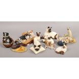 A collection of composite and ceramic cat figures to include Beswick, Sherratt and Simpson etc.
