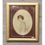 A gilt framed early 20th century mixed media portrait of a woman, signed and dated.