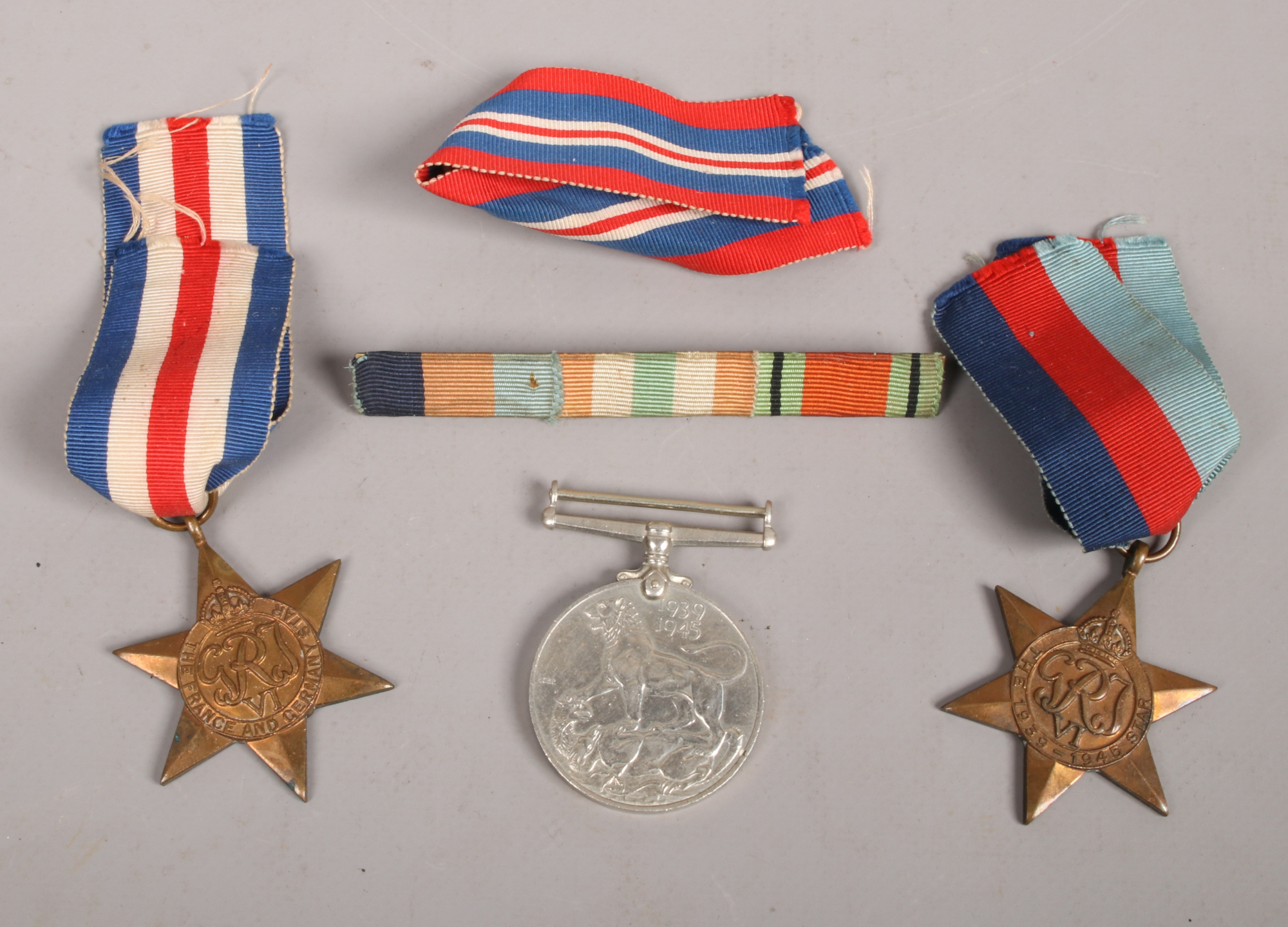 A trio of World War Two medals to include war medal 1939-1945, The 1939-1945 star and The France and