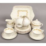 A Wedgwood Patrician six place teaset decorated in the Golden Ivy pattern.