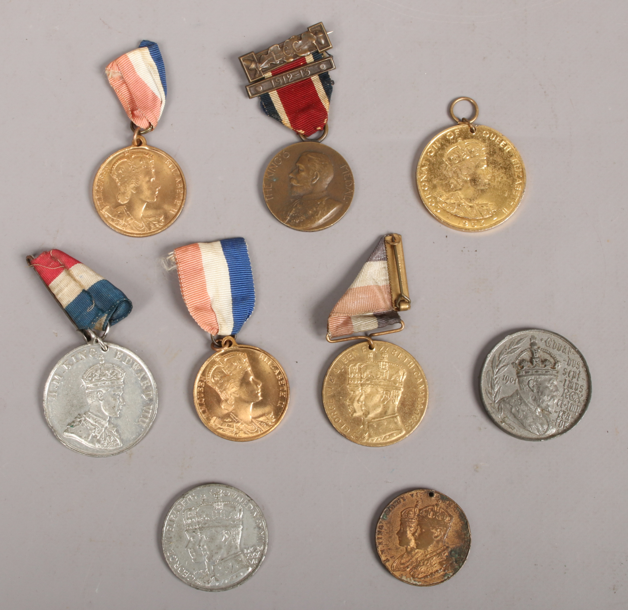 A collection of commemorative medals to include coronation, The Kings Medal, Royal Visit examples
