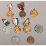 A collection of commemorative medals to include coronation, The Kings Medal, Royal Visit examples