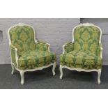 A French two seat sofa and two matching arm chairs.