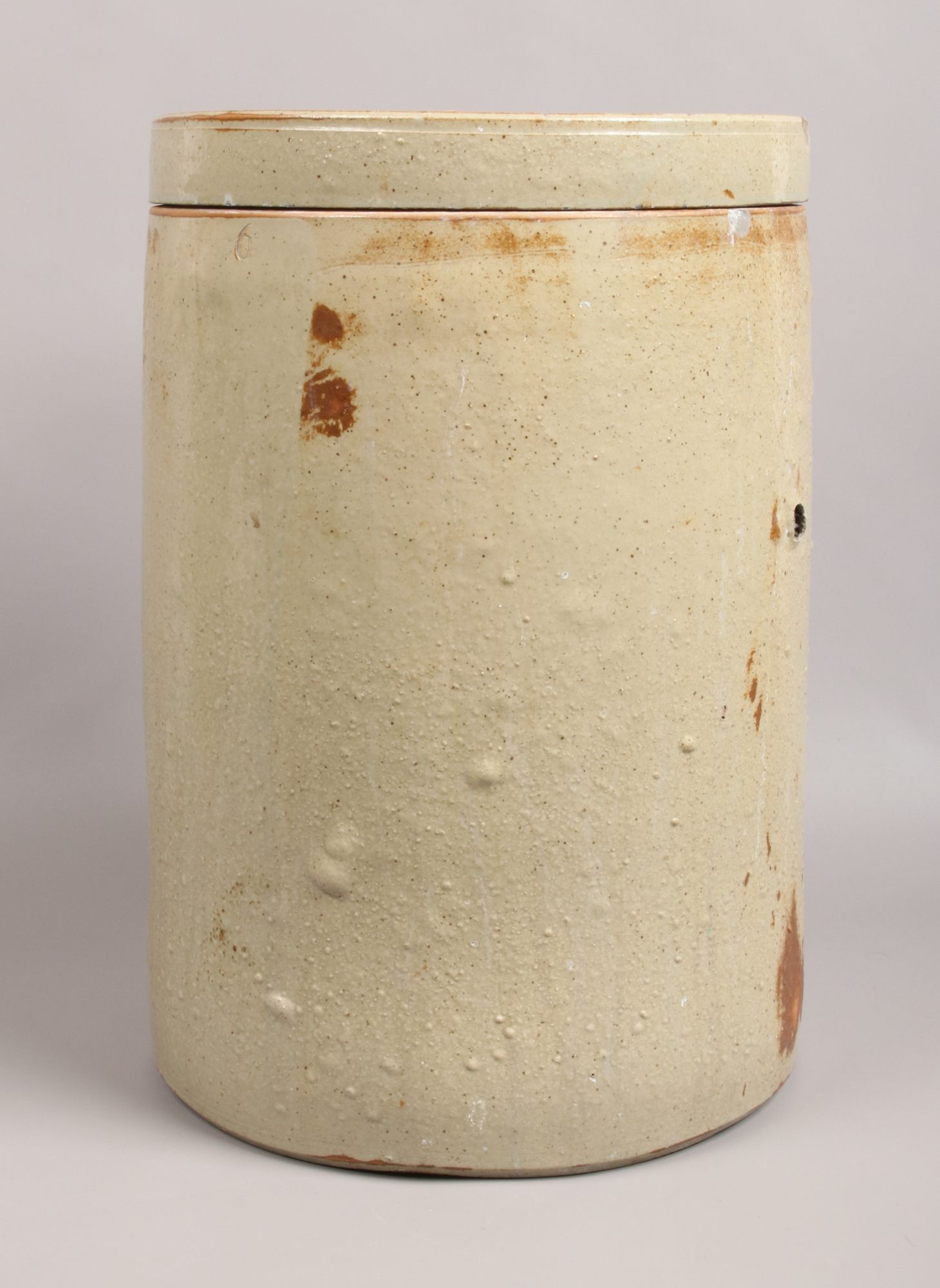 A large glazed stoneware flour bin and cover.