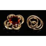 Two Pinchbeck Victorian brooches to include a knotted example.