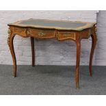 A 20th century French style Kingwood bureau plat with gilt metal mounts.