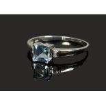 A 9ct white gold aquamarine and diamond ring, size N.