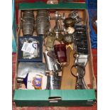 A box of miscellaneous to include hip flasks, possers, rum bottle, silver plate items, brass