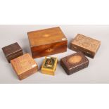 A collection of wooden boxes to include carved lacquered examples etc.