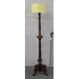 A Chippendale style standard lamp with later shade.