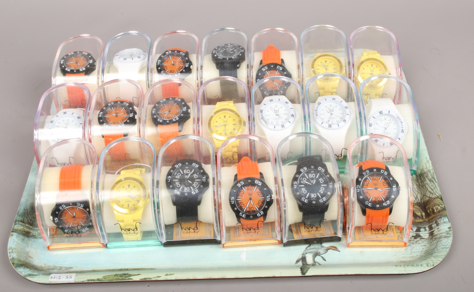 Twenty cased hand candy quartz wristwatches.