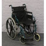 Anatlas Lite wheelchair, one foot rest missing.