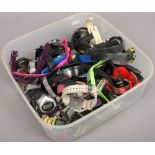 A box of assorted digital wristwatches.