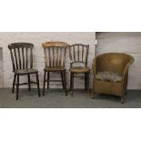 A group lot of chairs to include Lloyd loom style, slatback kitchen chairs, Bentwood chair etc,
