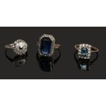 Three Art Deco 9ct gold and silver paste set dress rings.