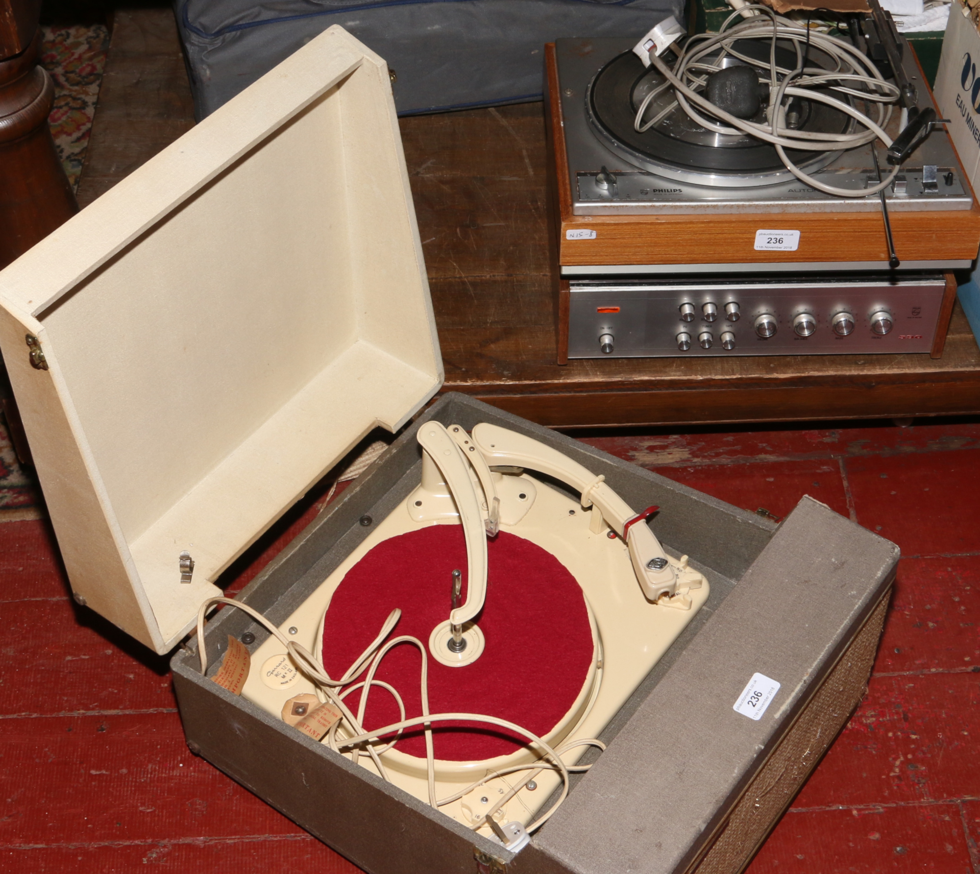 A Pilot stereophonic 4 picnic gramophone with Garrard turntable, along with a Philips 590