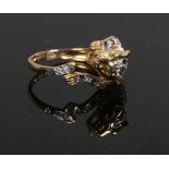 An 18ct gold sapphire and diamond pave set ring formed as a leaping leopard, size N.