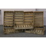 Seven wooden storage crates including three stencilled examples.