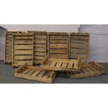 Eight wooden storage crates.