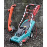 A Bosch electric lawn mower along with a Flymo Contour XT strimmer.