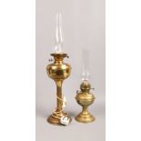 Two brass based oil lamps one converted to electricity.