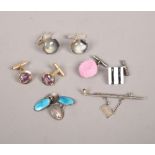 Four pairs of gent's cufflinks including enameled silver pair and a novelty tie pin formed as a golf