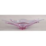 A Lilac coloured art glass bowl.Condition report intended as a guide only.chip to base.