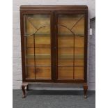 A mahogany display cabinet along with a lead glazed corner cupboard and hi-fi cabinet.