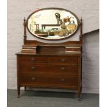 An Edwardian mahogany dressing table.