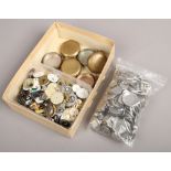 A box of assorted watch movements, pocket watch cases and watch backs.