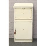 A 1950s painted kitchen cabinet.