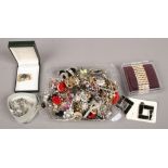A quantity of costume jewellery including earrings, bracelets, brooches etc.