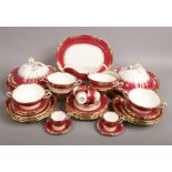A Spode Lancaster red six place dinner service.Condition report intended as a guide only.No chips or