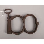A set of steel 19th century Hiatt handcuffs with keyCondition report intended as a guide only.Cut