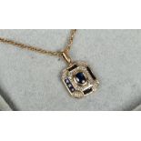 An Art Deco style 9ct gold sapphire and diamond pendant on 9ct chain. (pendant approx 1cm X 1cm) (