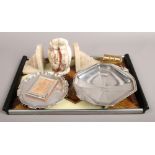 An Art Deco serving tray pair of alabaster bookends, perpetual calendar and a silver plated salver