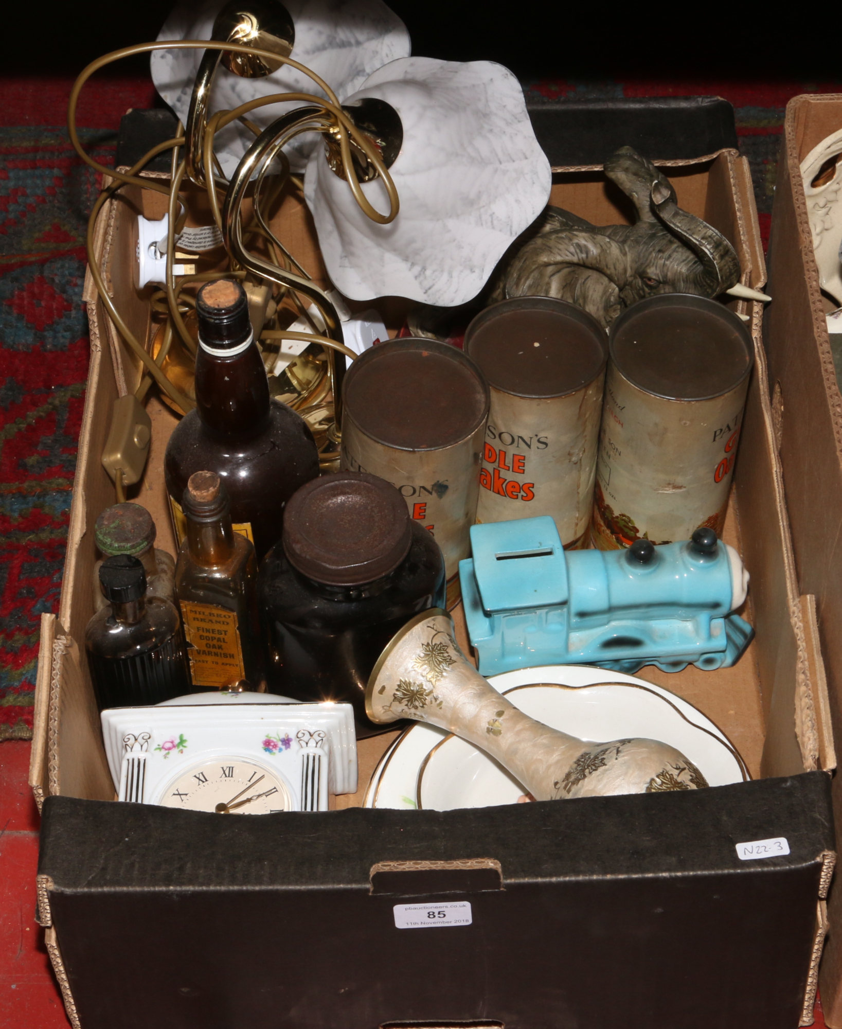 A box lot of miscellaneous to include table lamps, old bottles and tins, composite model of