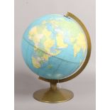 A Philips 12" Political Challenge globe on brass effect stand.