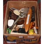 A box of miscellaneous to include dressing table sets, wooden items, space shuttle drinking glass