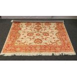 A beige ground Ziegler rug with floral design 230cm x 160cm.